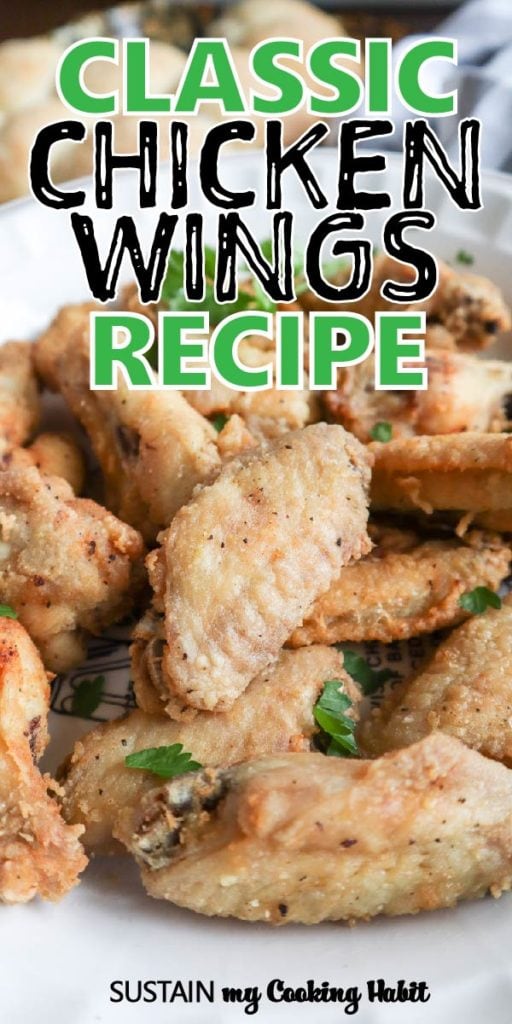 Close up of cooked chicken wings with text overlay "classic chicken wings recipe."