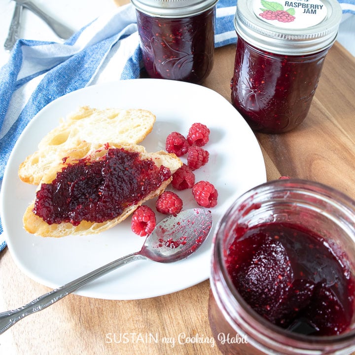 delicious raspberry jam spread over toasted croissant