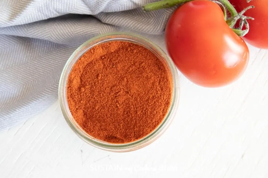 Overhead view of dried tomato powder.