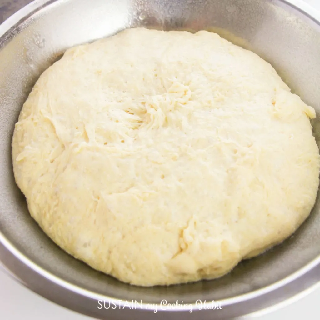 Siring the ingredients to form a ball of dough.