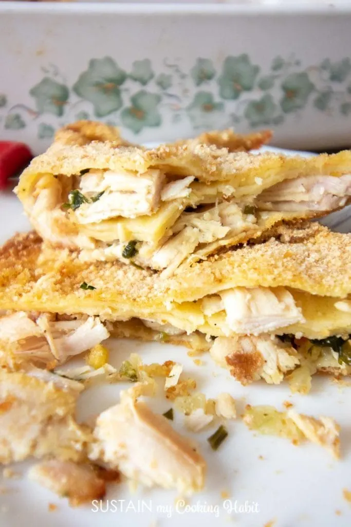  a plate of turkey filled crepes