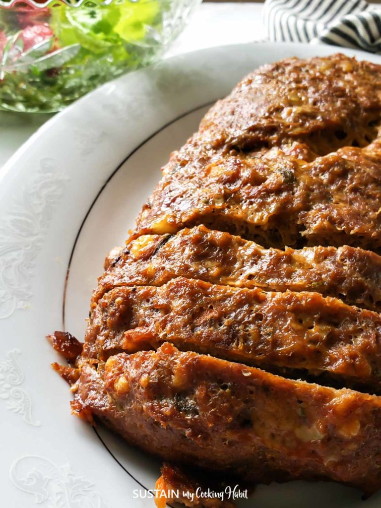 close up image of a meatloaf cut into individual slices