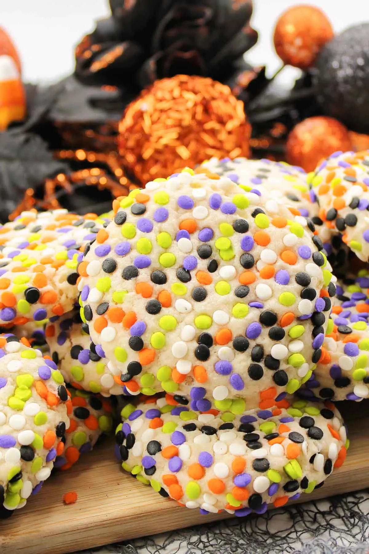 Close up of Halloween cookies covered in sprinkles.