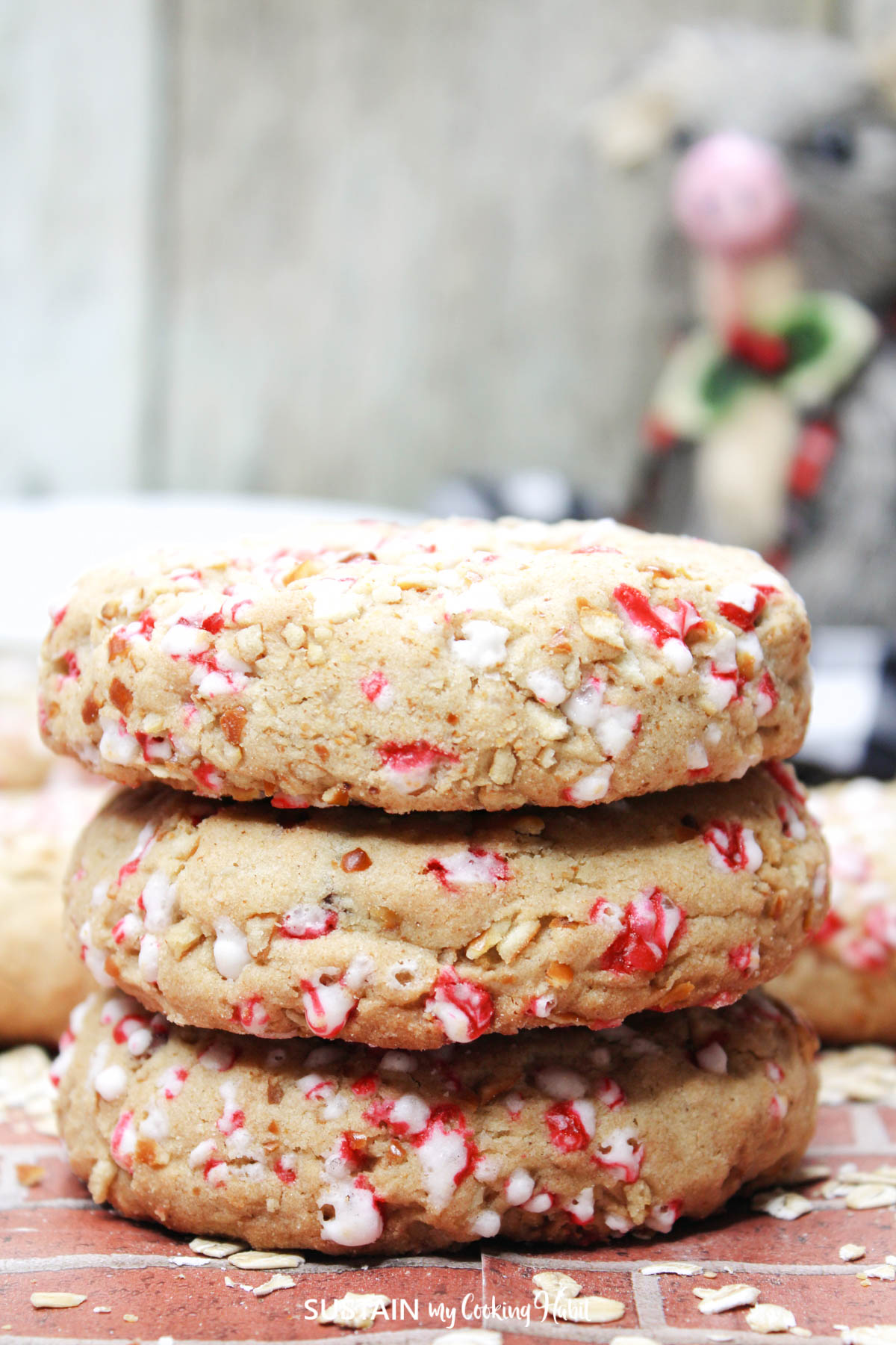 Crushed candy can oatmeal cookies stacked together.