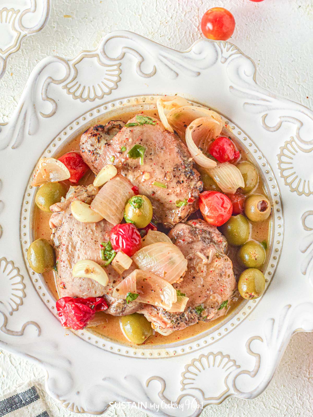 Overhead view of Chicken Provencal in a serving dish.