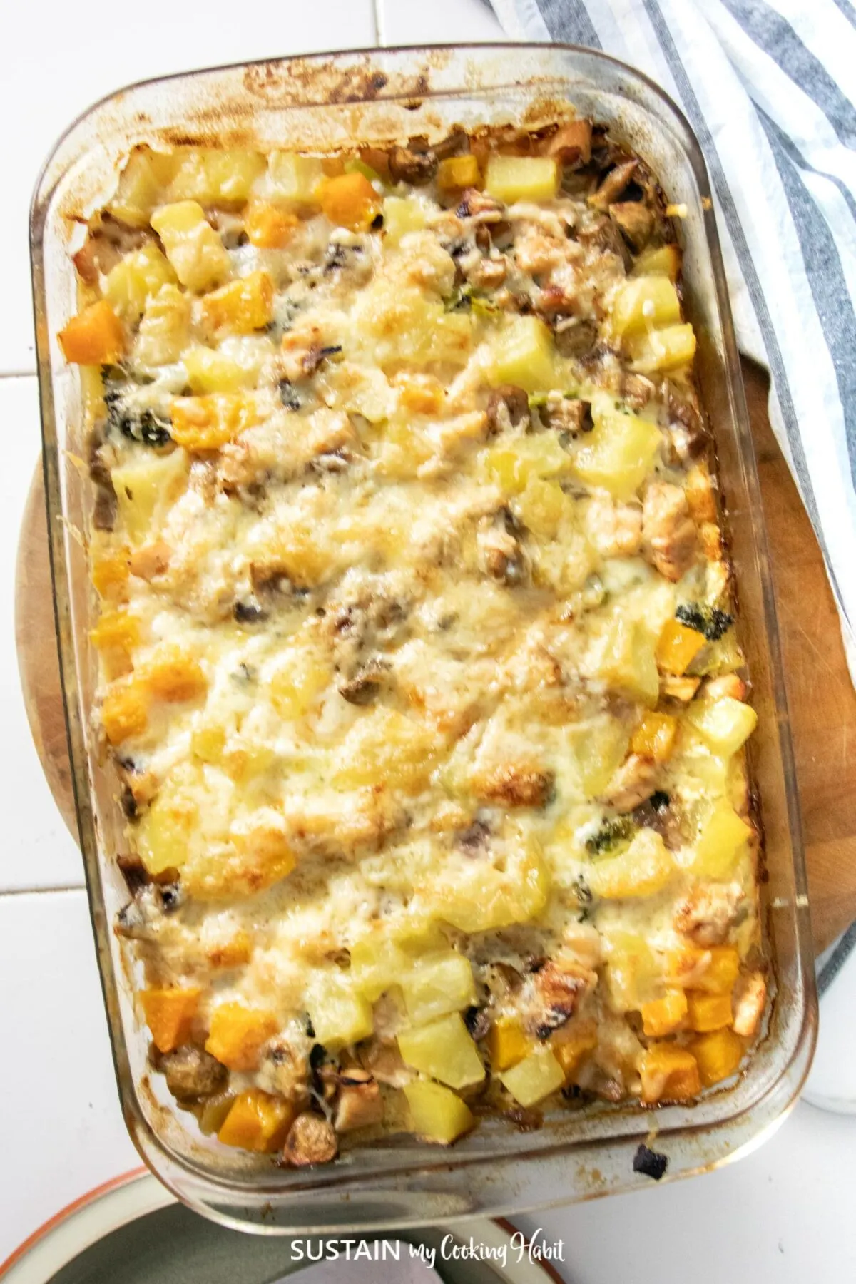 Overhead view of chicken and potato casserole in a dish.