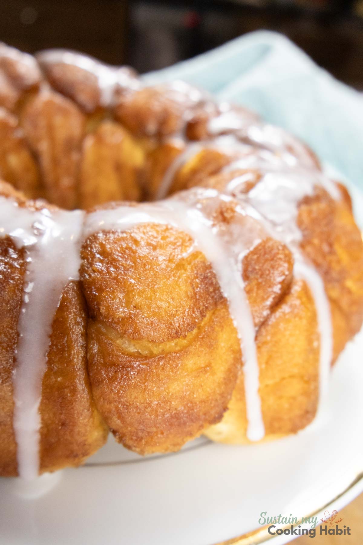 Close up of monkey bread with icing. 