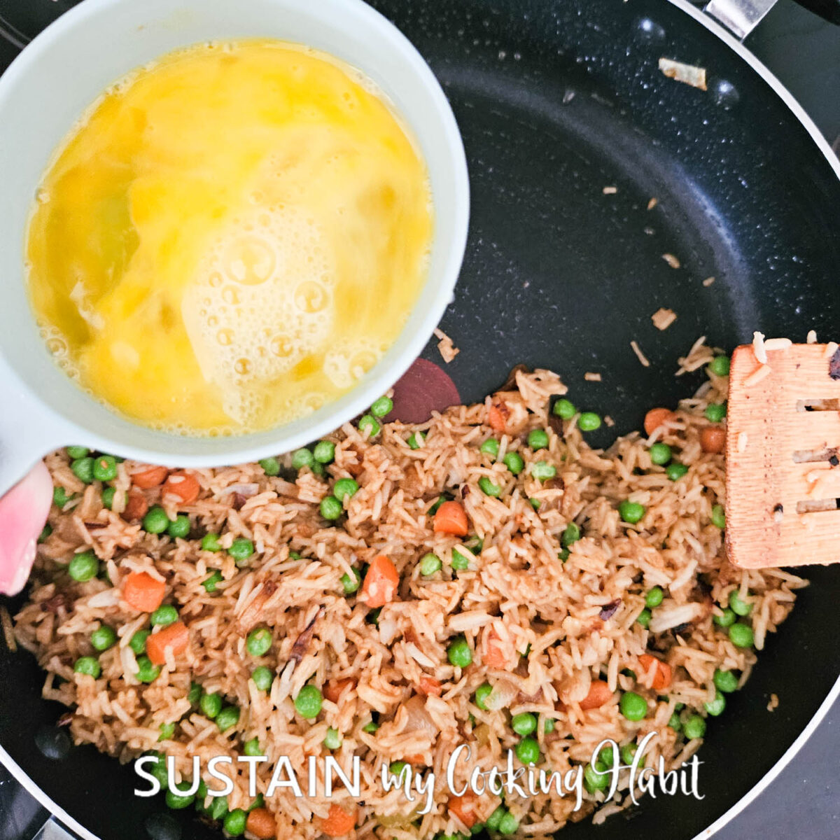 Beaten eggs in a cup. 