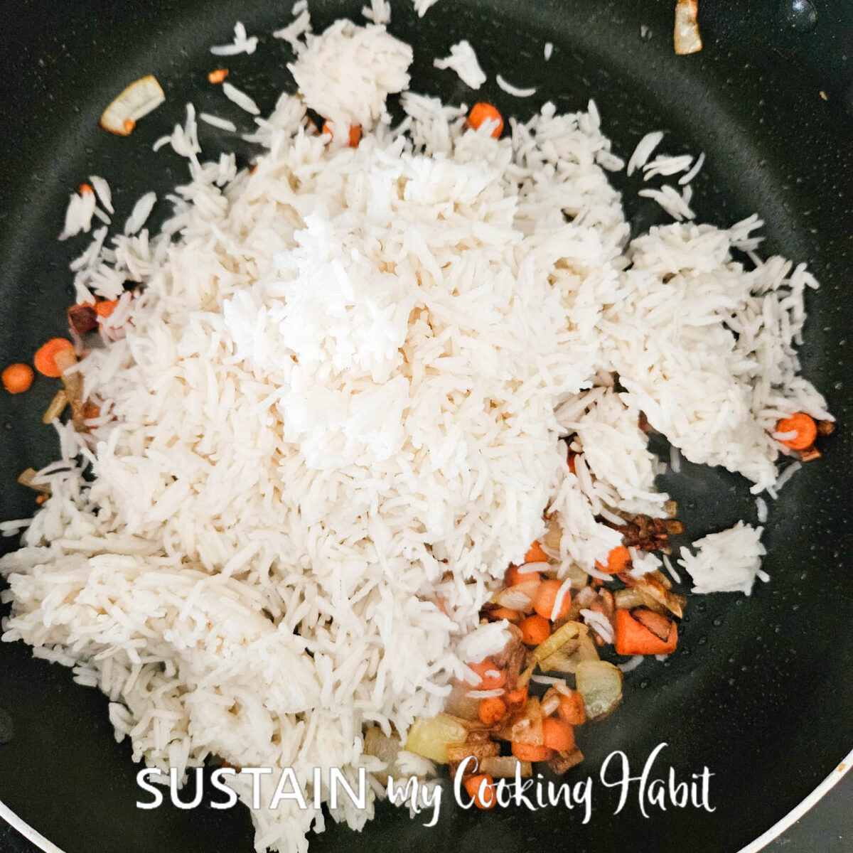 Adding basmati rice to vegetables. 