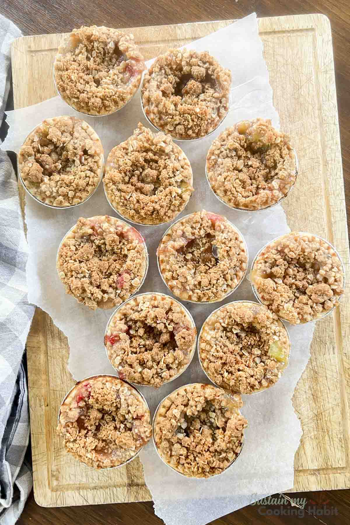 Overhead view of rhubarb tarts in mini pie shells.