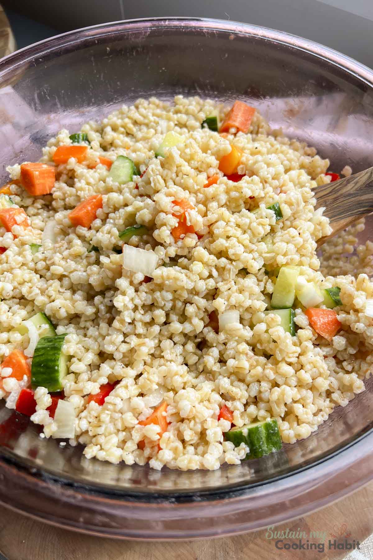 Cold barley salad with vegetables.