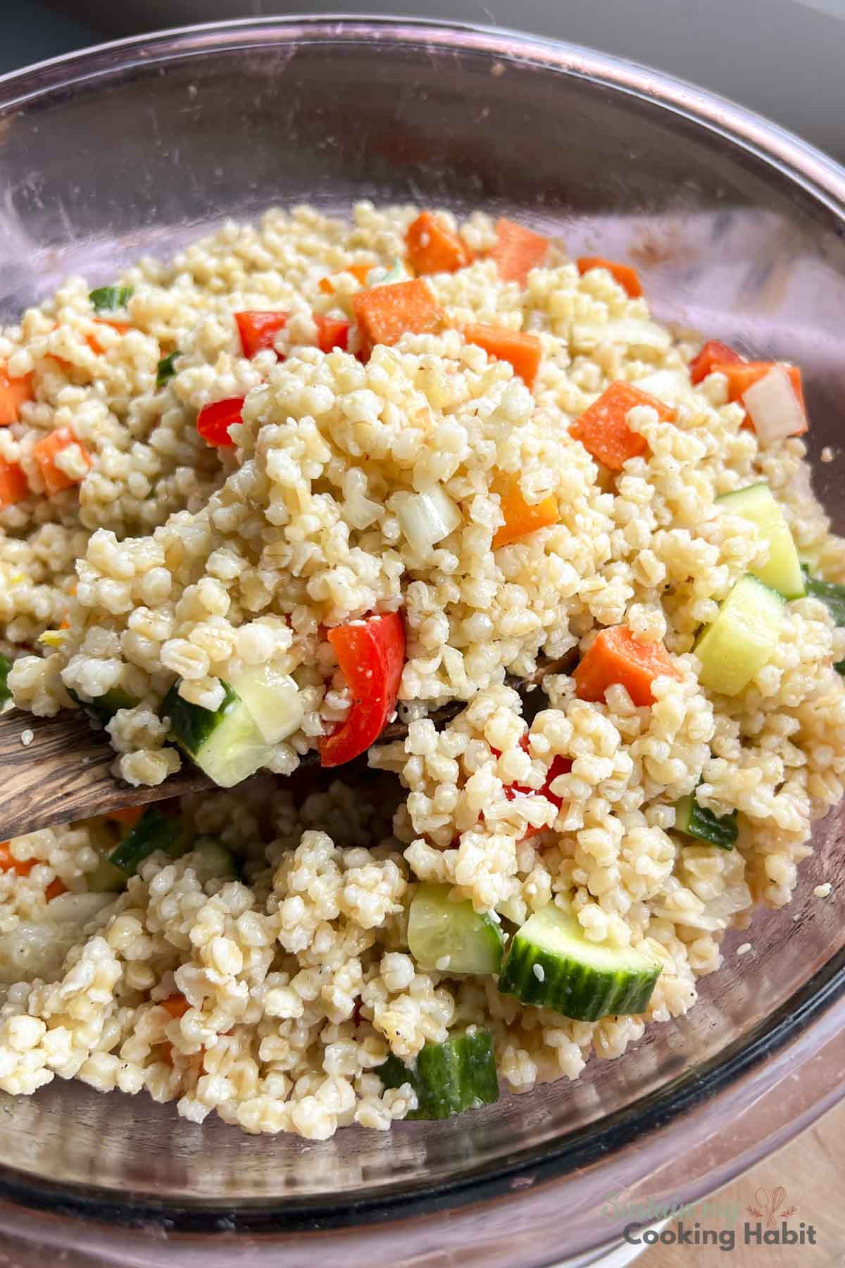 Cold barley salad with vegetables.