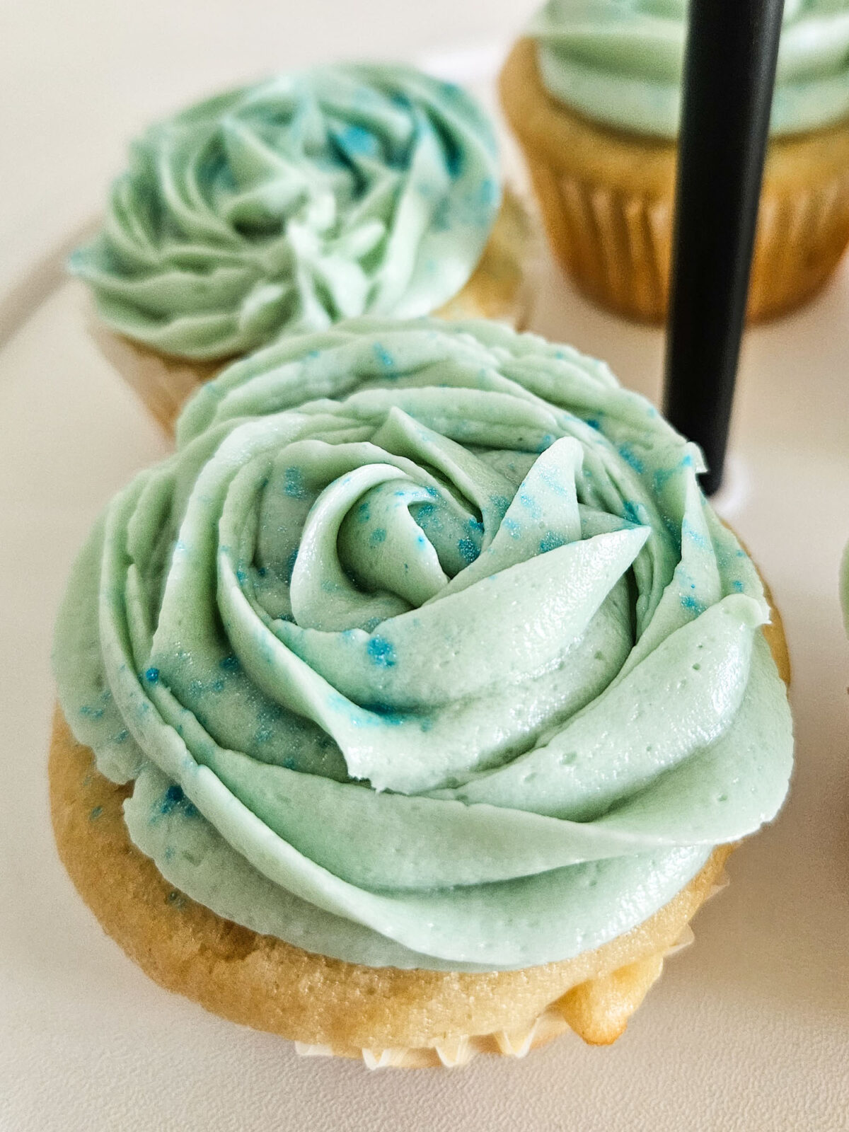 Close up of frosted cupcake.