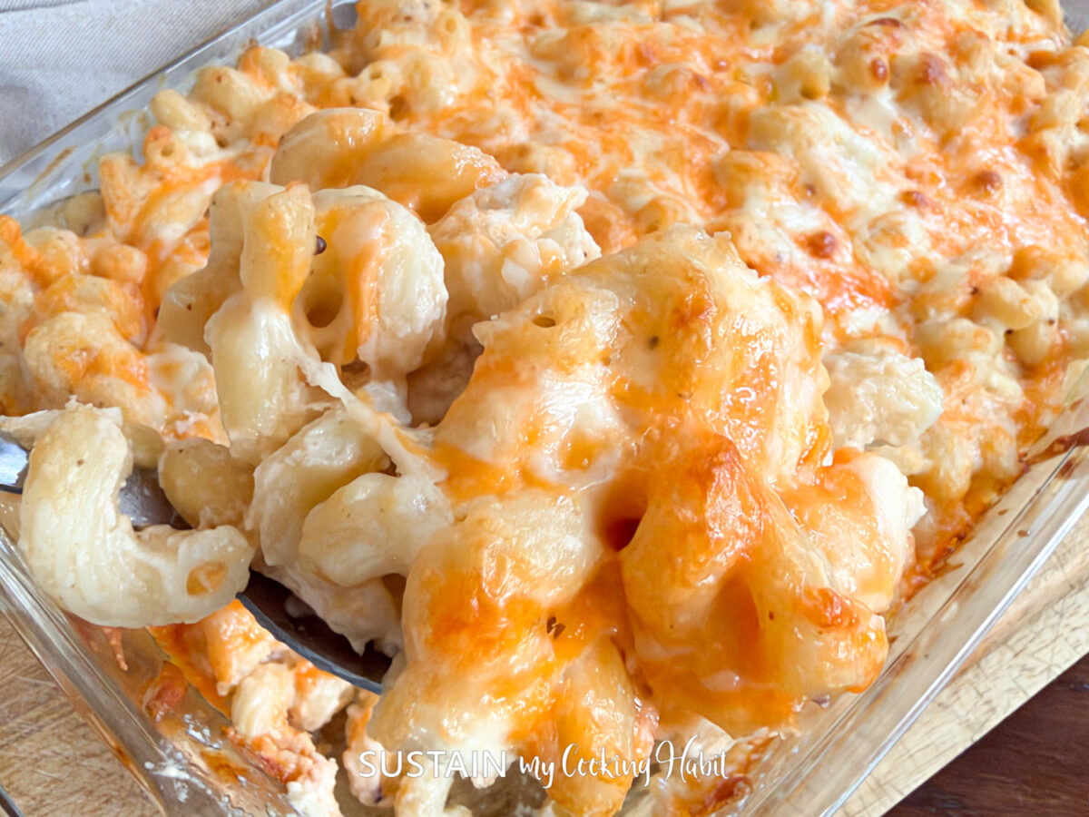 Scooping mac and cheese.